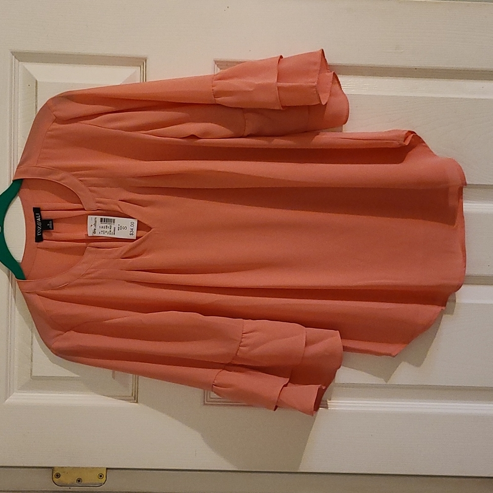 Peach ruffle sleeve top